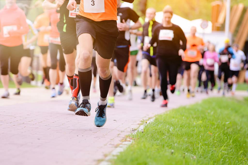 Summer running race in the park, people running